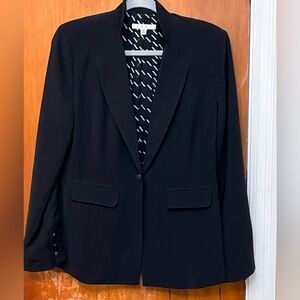 CAbi Black Womens Blazer. Patterned lining great condition. Faux front pockets 4